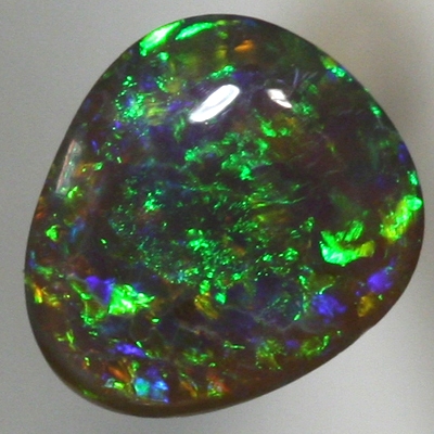 SOLID BLACK OPAL Pretty! Sparkling and bright gemmy green fire. SEE VIDEO